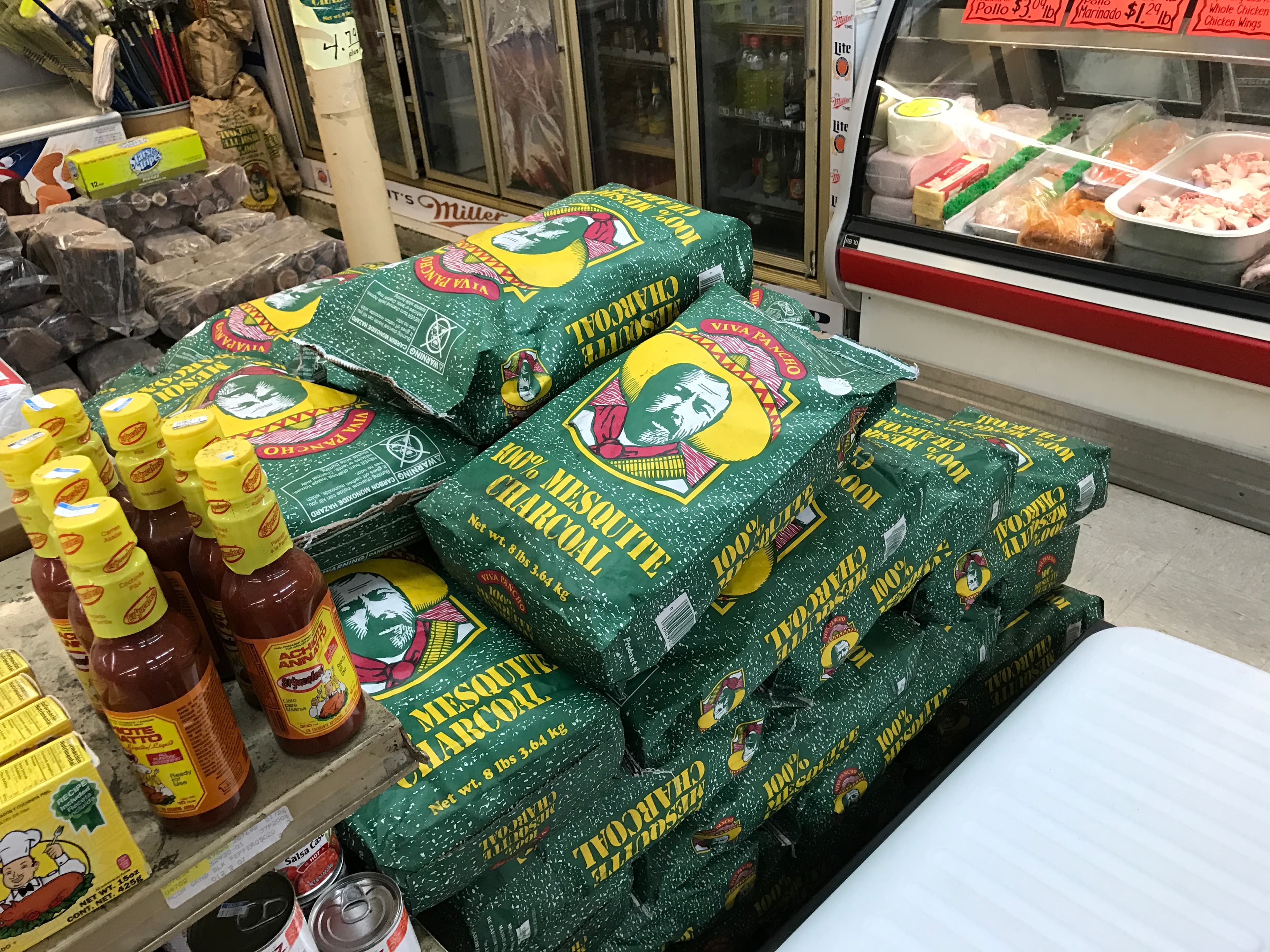 Viva Pancho charcoal stacked at a local meat market