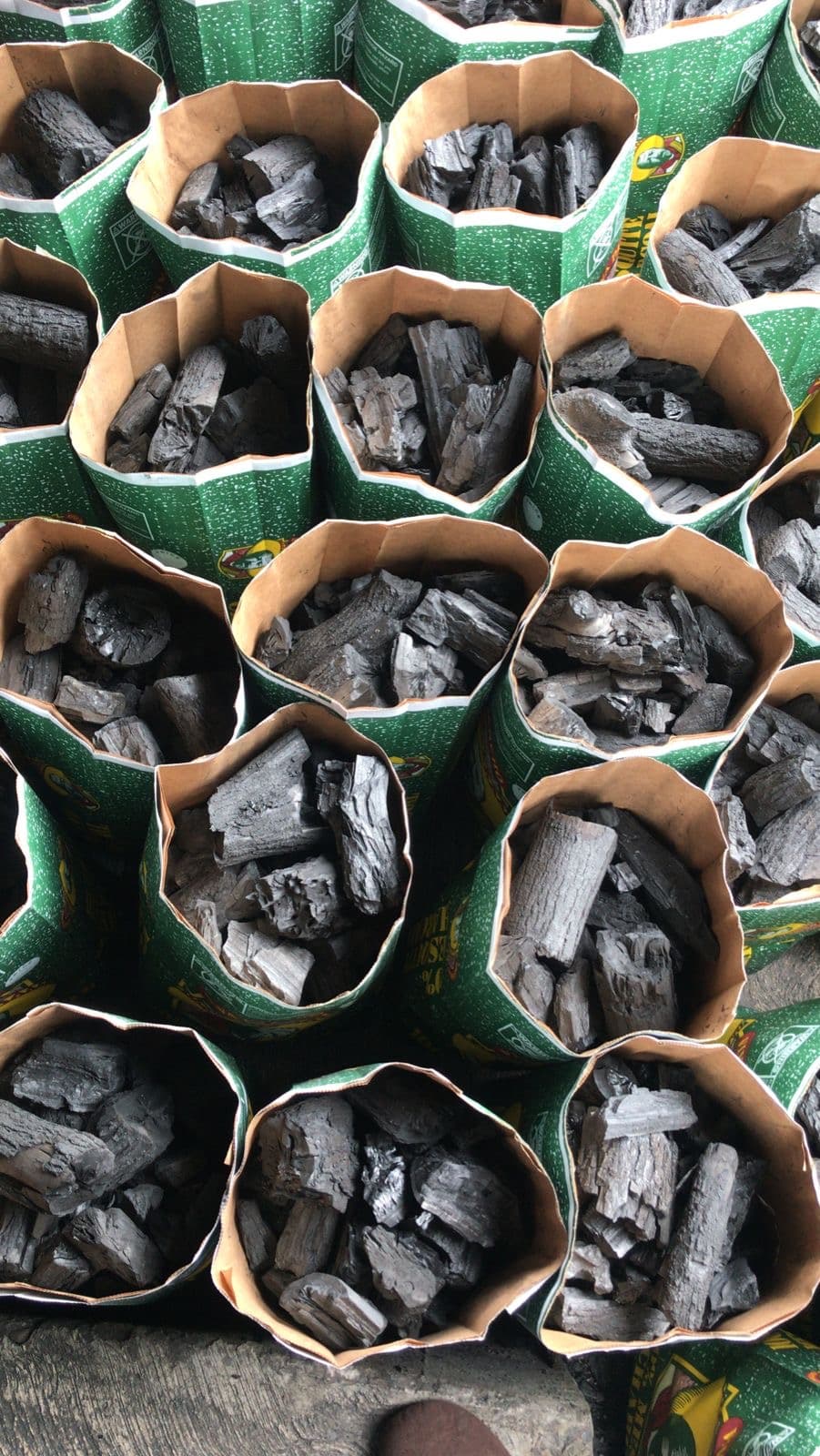 Unsewn bags of mesquite charcoal
